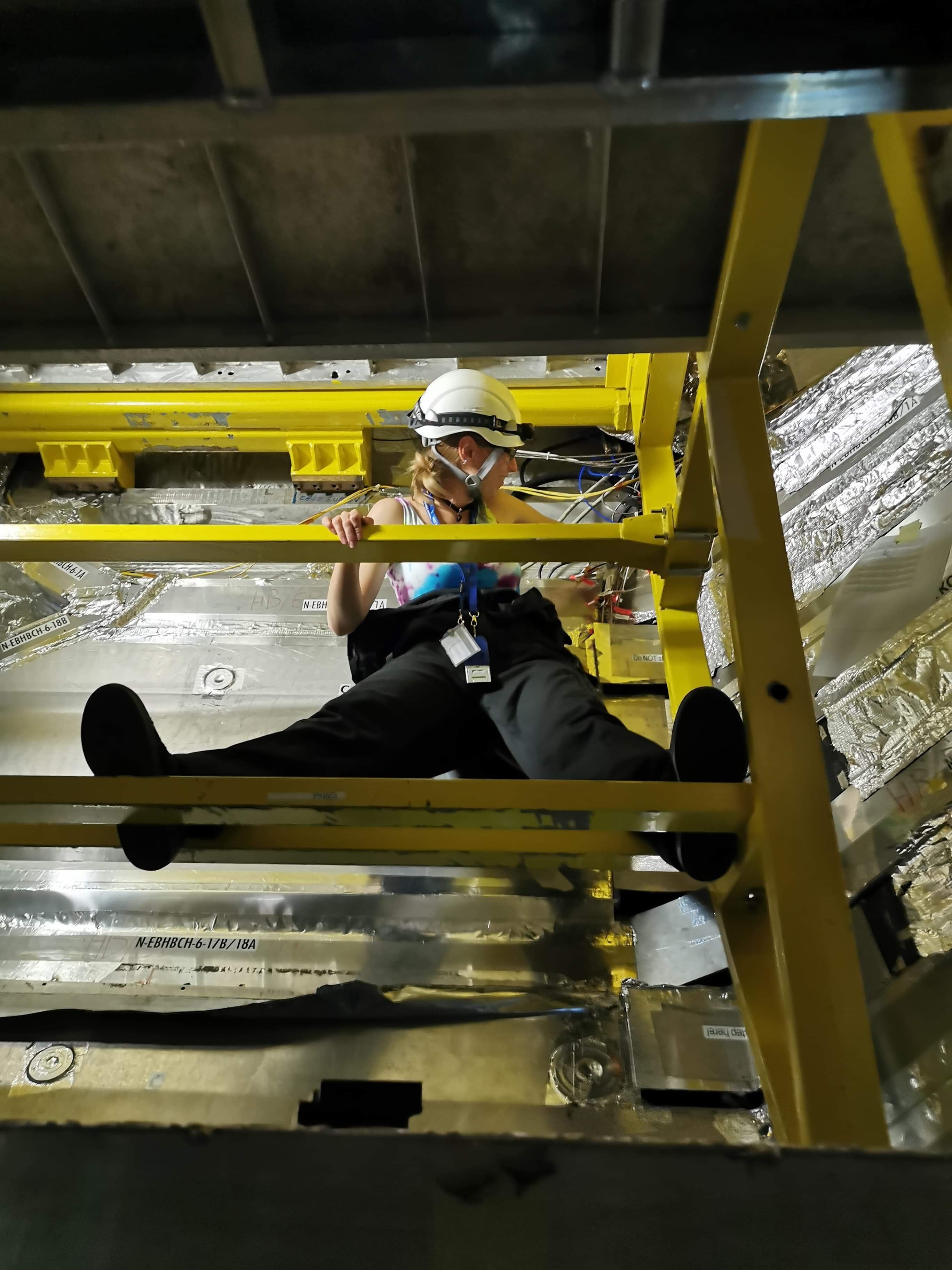 Myself connecting the megatile fibers for the CMS HCAL Barrel Upgrade. Photo Credit: CERN, Yongbin Feng. 2019