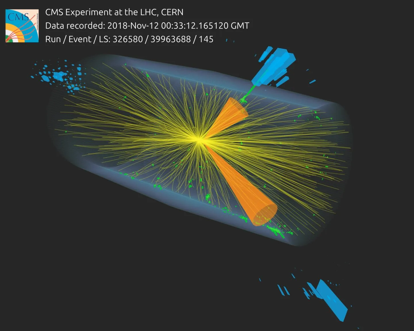 CMS event display of a lead-lead collision, which produced two back-to-back jets likely created by two subatomic “speedboats.” The jets are indicated by the orange cones. Credit: CMS/CERN