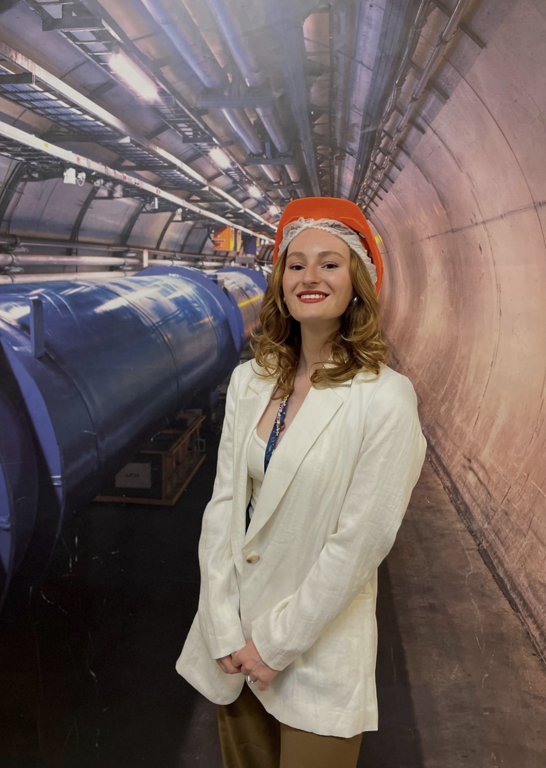 Ilaria in front of the LHC wallpaper at Point 5.