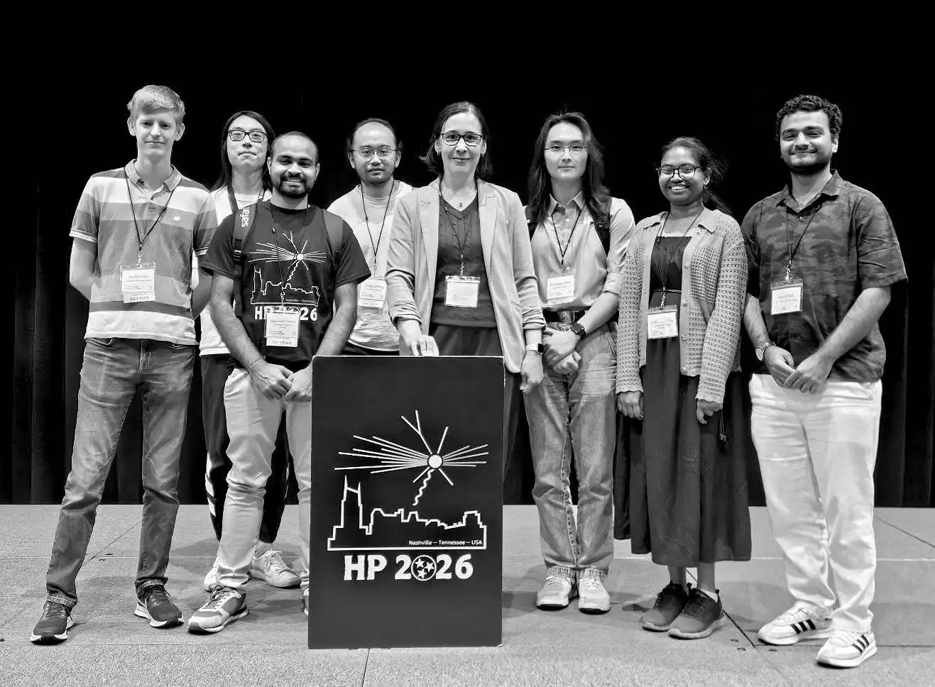 Members of the University of Illinois Chicago High Energy Nuclear Physics group, led by Professors Olga Evdokimov and Austin Baty. From left to right: Prof. Austin Baty, Zheng Huang (UIC graduate student), Dr. Ragunath Pradhan (UIC postdoc and lead analyzer of the wake study), Jingyu Zheng (UIC alumnus, now at Vanderbilt), Prof. Olga Evdokimov, Bill Zhou (UIC graduate student), Dr. Sruthy Das (UIC postdoc), Vipul Pant (UIC graduate student). Photo courtesy of Prof. Olga Evdokimov