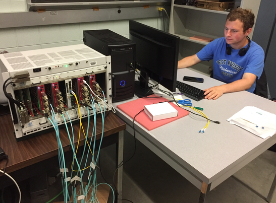 Me programming some FPGA boards as an undergraduate research assistant (Rutgers University, New Jersey, USA) 