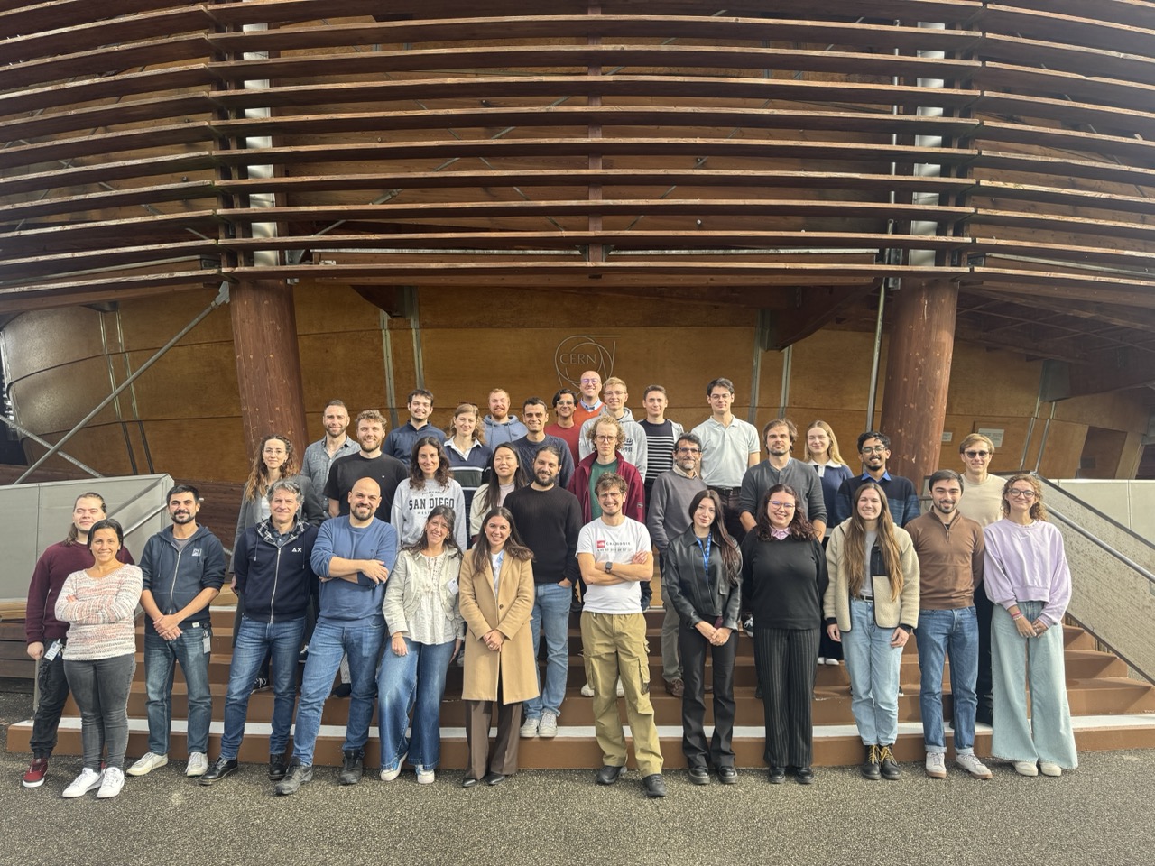 Group photo of the NGT Hackathon members in front of the Globe, at CERN.